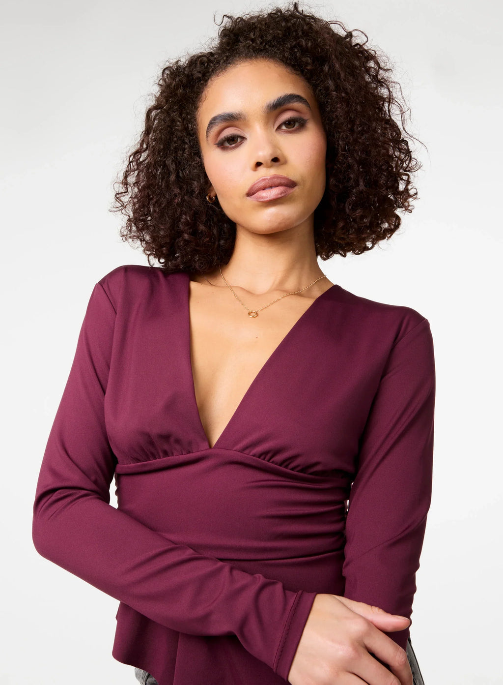 Stretch V Neck Hanky Hem Top